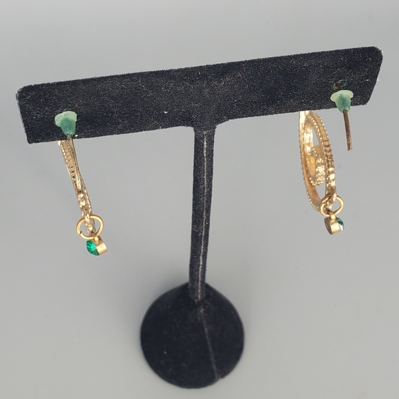 Spiral Green Goldtone Earrings and Cross Black And Green Bracelet - Picture 6 of 12